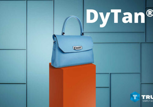 Partnerschaft für revolutionäre Ledergerbung Photo by Trumpler, blue leather handbag against a blue background